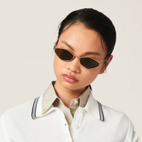 Miu Miu MU56ZS 5AK09Z-56 Gold / Dark Brown Lenses