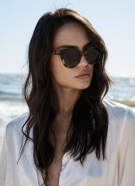 A girl wearing Bask Eyewear Echo Havanna Tortoise